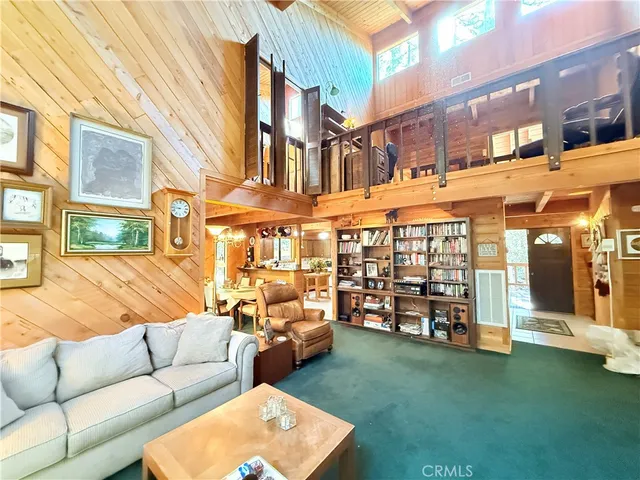 a large kitchen with a large window and cabinets