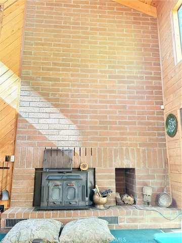 a kitchen with stainless steel appliances kitchen island granite countertop a sink and cabinets