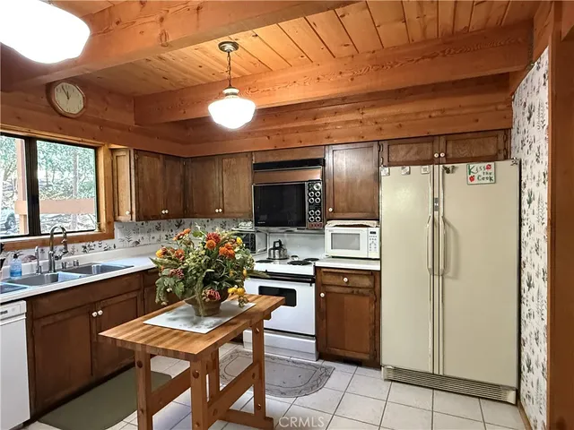 a couch sitting in a room next to a window