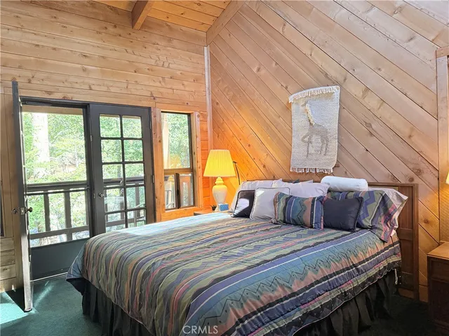 a view of balcony with wooden floor