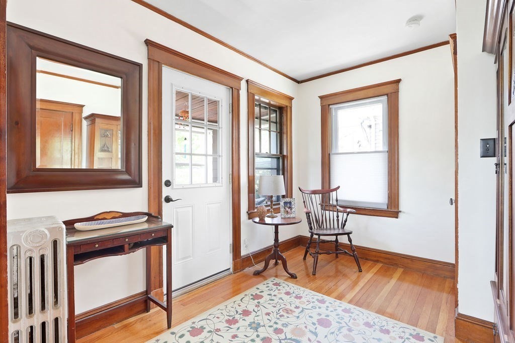 43-45 Owencroft Road, Unit 2 Boston, MA 02124 - Photo 2 of 36 a view of a livingroom with furniture and a window