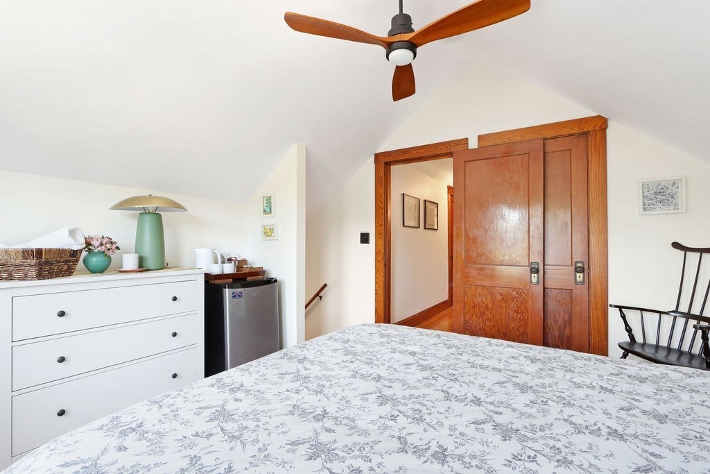 43-45 Owencroft Road, Unit 2 Boston, MA 02124 - Photo 26 of 36 a bedroom with a bed and a dresser