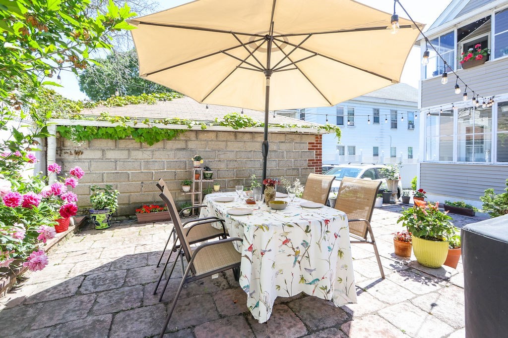 43-45 Owencroft Road, Unit 2 Boston, MA 02124 - Photo 31 of 36 a outdoor view with a sitting space