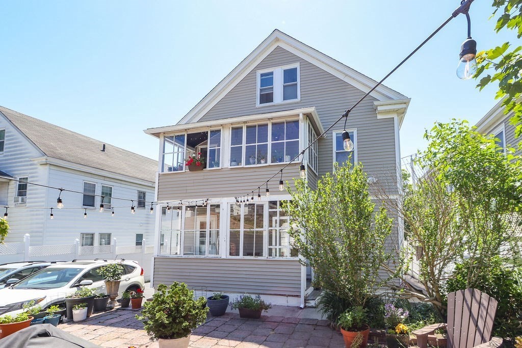 43-45 Owencroft Road, Unit 2 Boston, MA 02124 - Photo 34 of 36 a front view of a house with a garden
