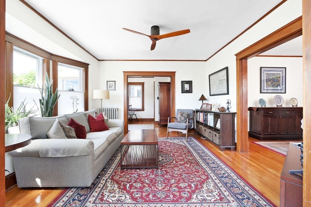 43-45 Owencroft Road, Unit 2 Boston, MA 02124 - Photo 5 of 36 a living room with furniture ceiling fan and a rug