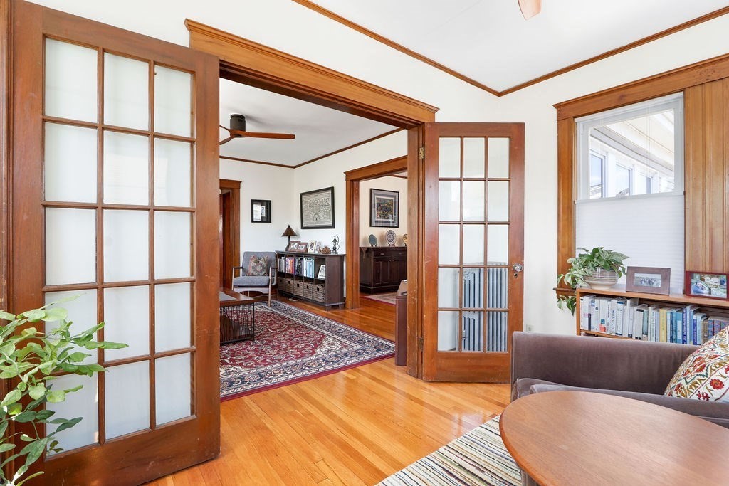 43-45 Owencroft Road, Unit 2 Boston, MA 02124 - Photo 6 of 36 a bedroom with furniture and a window