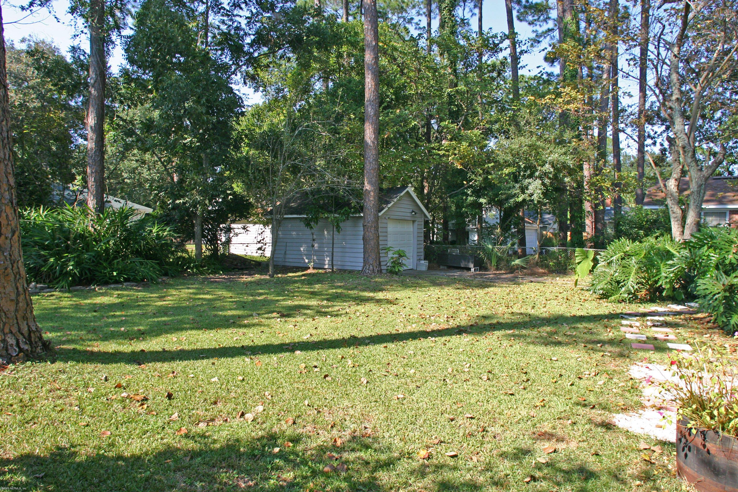 1510 Nicholson Road Jacksonville, FL 32207 - Photo 12 of 14 a view of a house with a yard