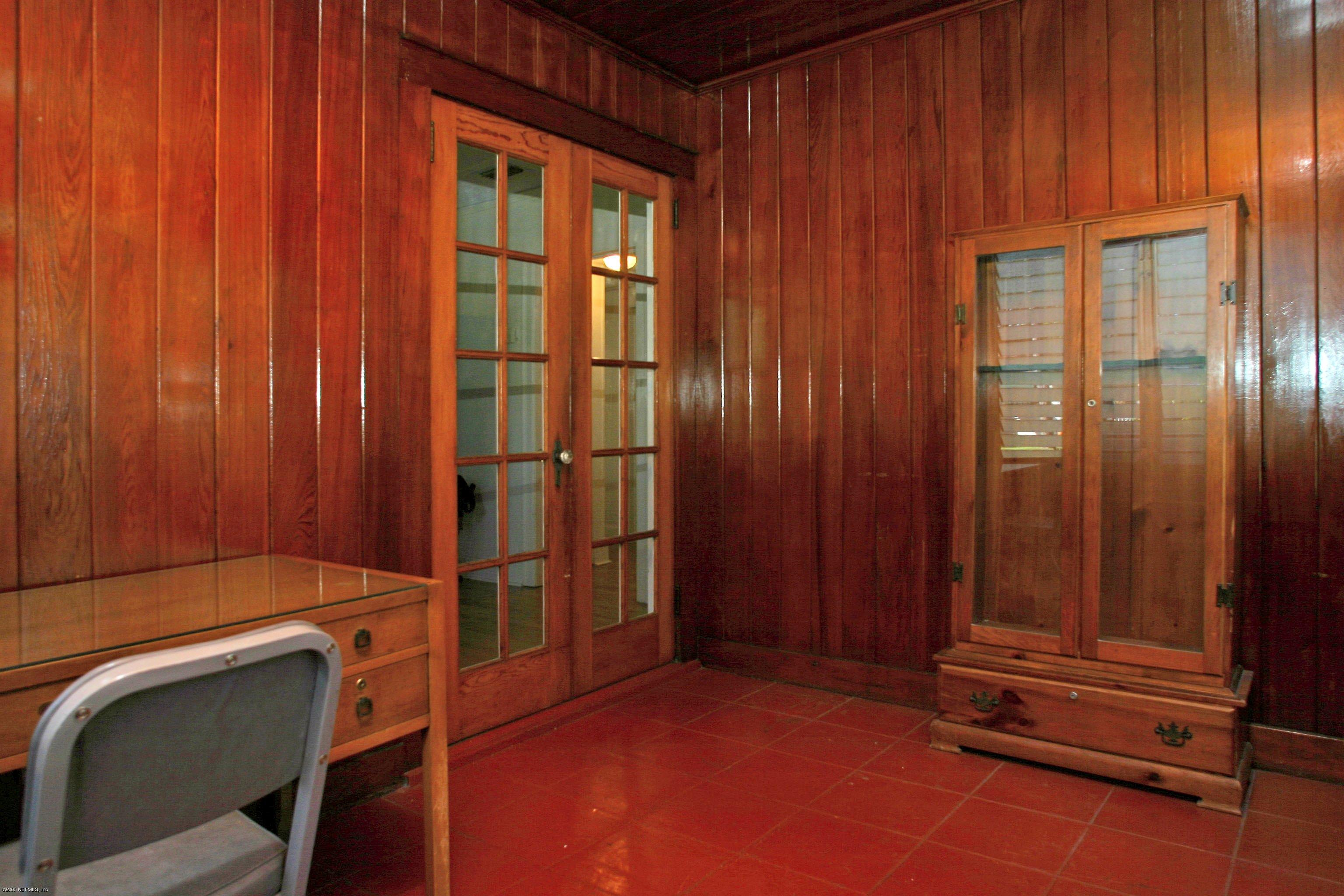 1510 Nicholson Road Jacksonville, FL 32207 - Photo 6 of 14 an empty room with windows