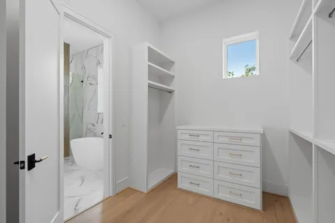 a bathroom with a sink toilet and vanity