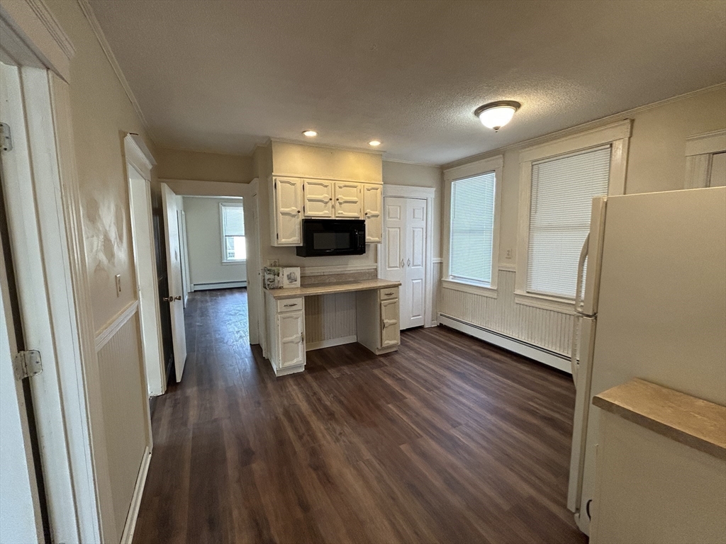 7 Wingate Street Shrewsbury, MA 01545 - Photo 11 of 21 a view of kitchen with sink microwave refrigerator and stove