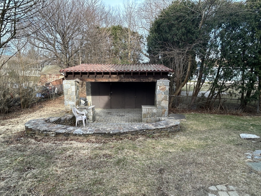7 Wingate Street Shrewsbury, MA 01545 - Photo 19 of 21 a front view of a house with garden