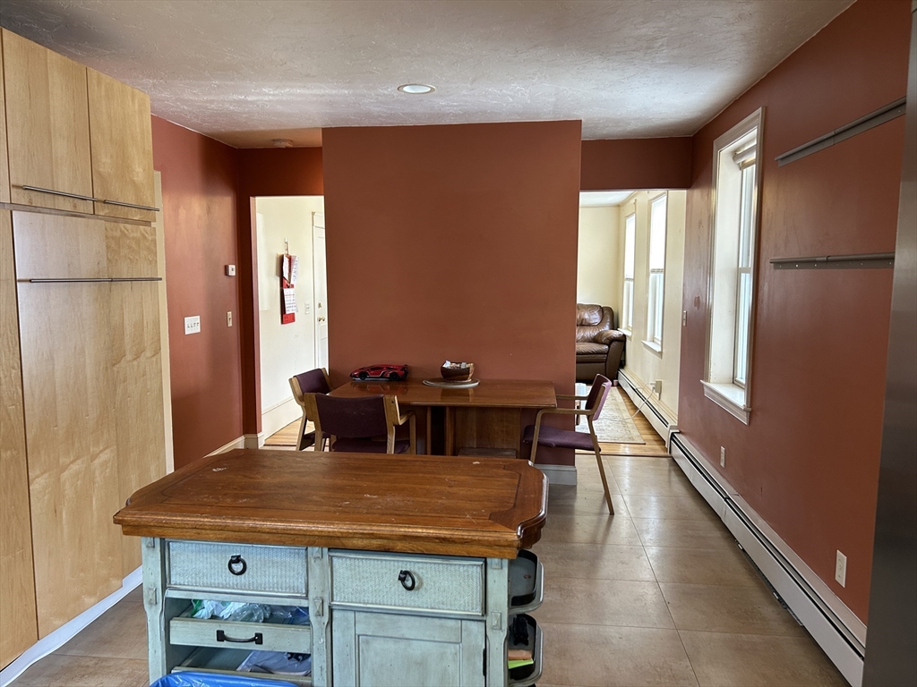 7 Wingate Street Shrewsbury, MA 01545 - Photo 3 of 21 a view of a dining room with furniture window and wooden floor