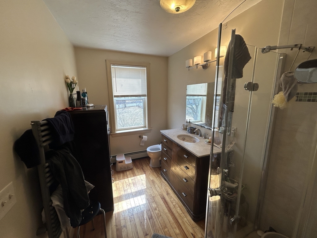 7 Wingate Street Shrewsbury, MA 01545 - Photo 7 of 21 a living room with furniture and a window