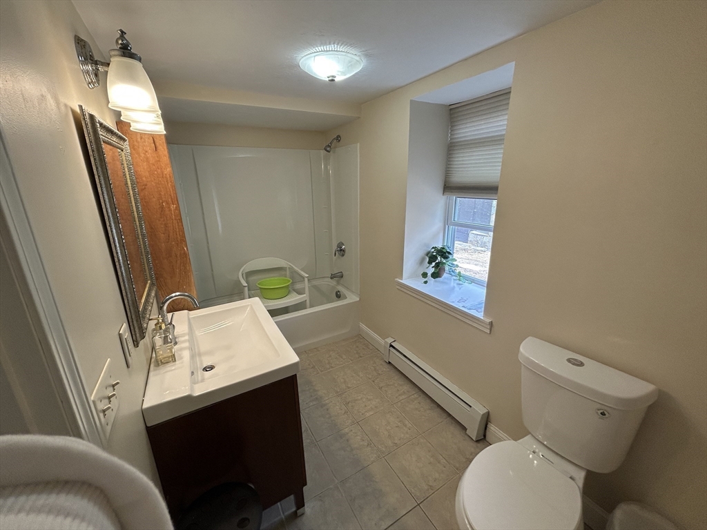 7 Wingate Street Shrewsbury, MA 01545 - Photo 8 of 21 a bathroom with a sink toilet and mirror