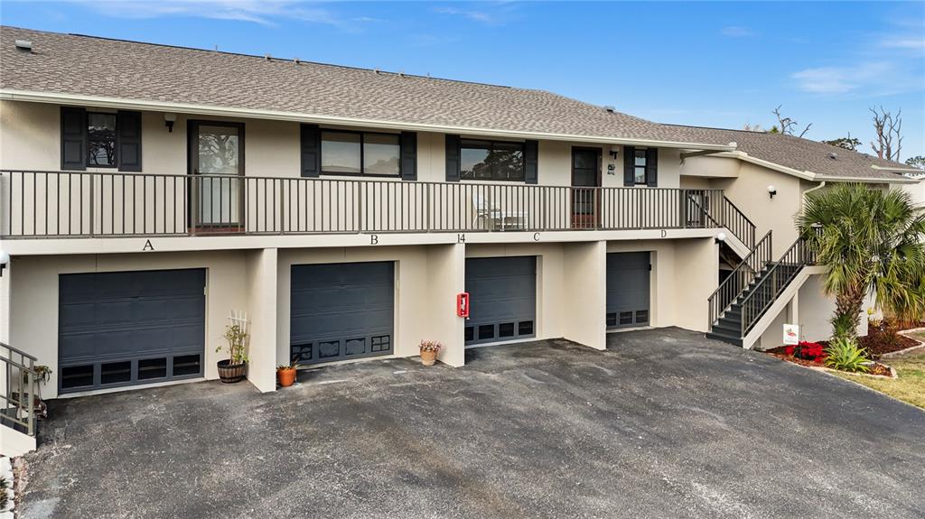 4260 Placida Road, Unit 14C Englewood, FL 34224 - Photo 25 of 37 a house view with a outdoor space