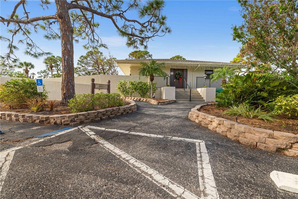 4260 Placida Road, Unit 14C Englewood, FL 34224 - Photo 31 of 37 a front view of a house with garden