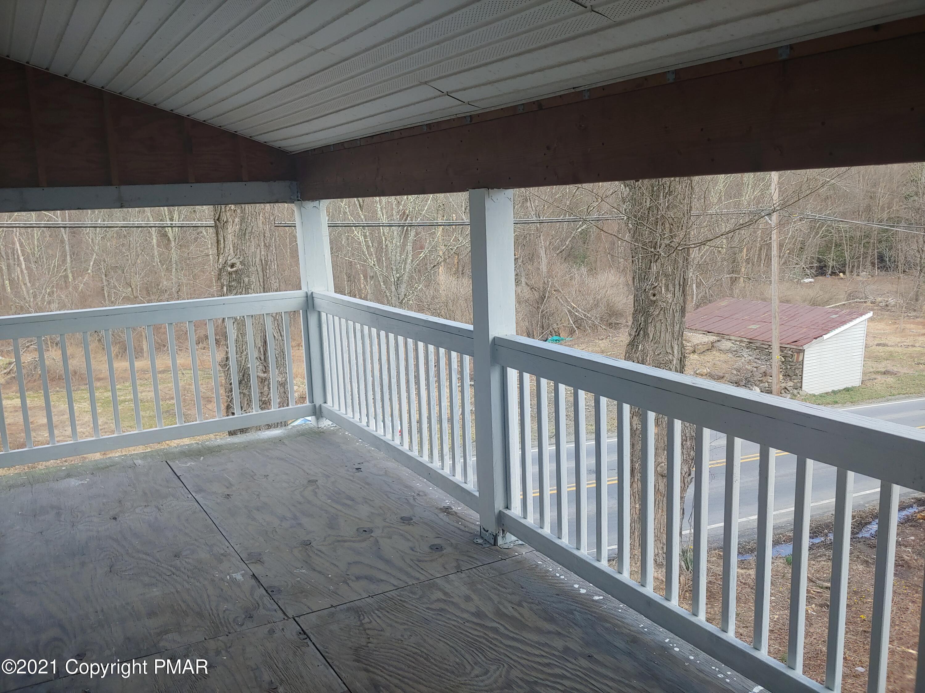 516 Red Rock Road Cresco, PA 18326 - Photo 30 of 47 a view of a balcony
