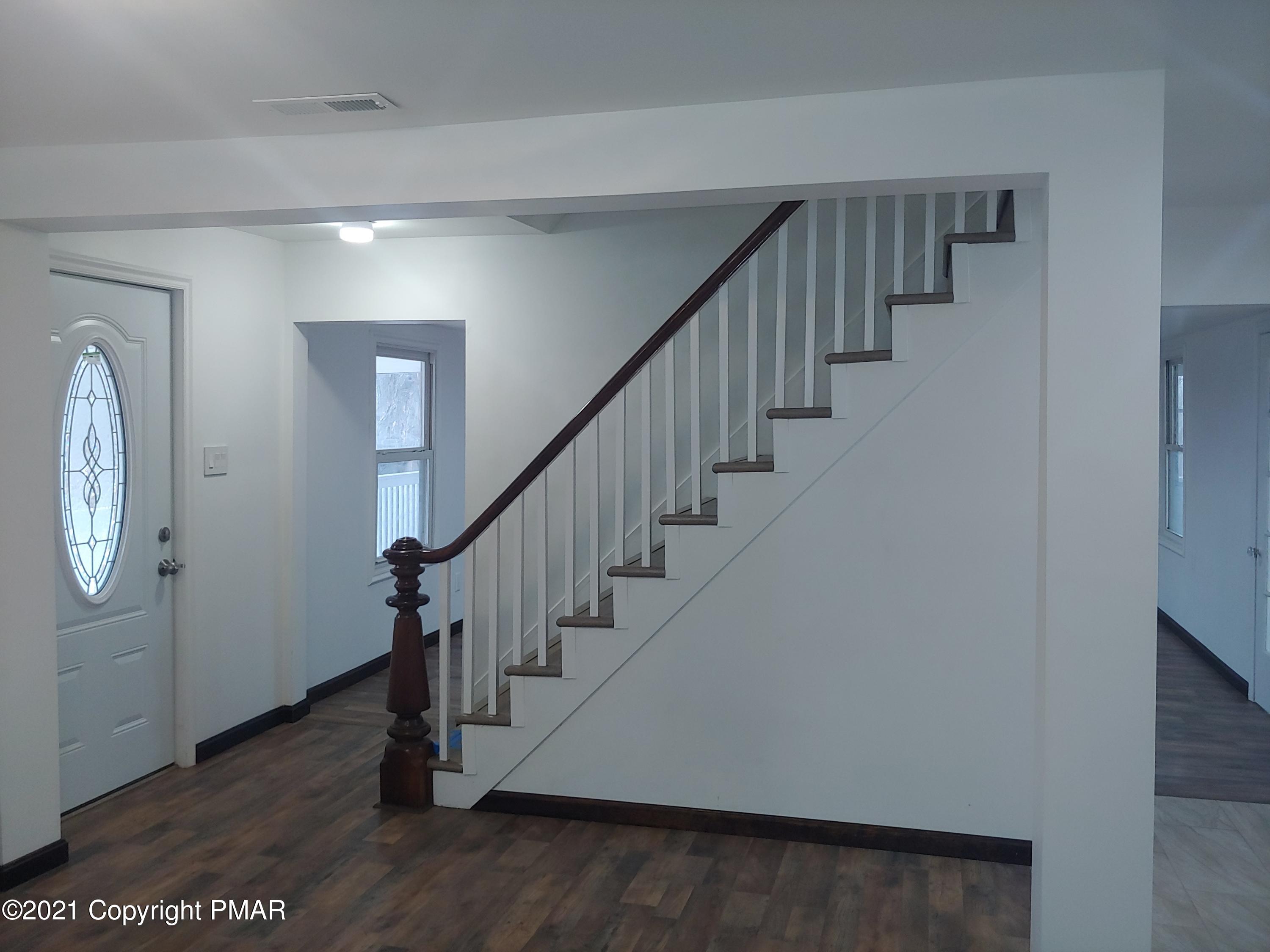 516 Red Rock Road Cresco, PA 18326 - Photo 3 of 47 a view of entryway with wooden floor