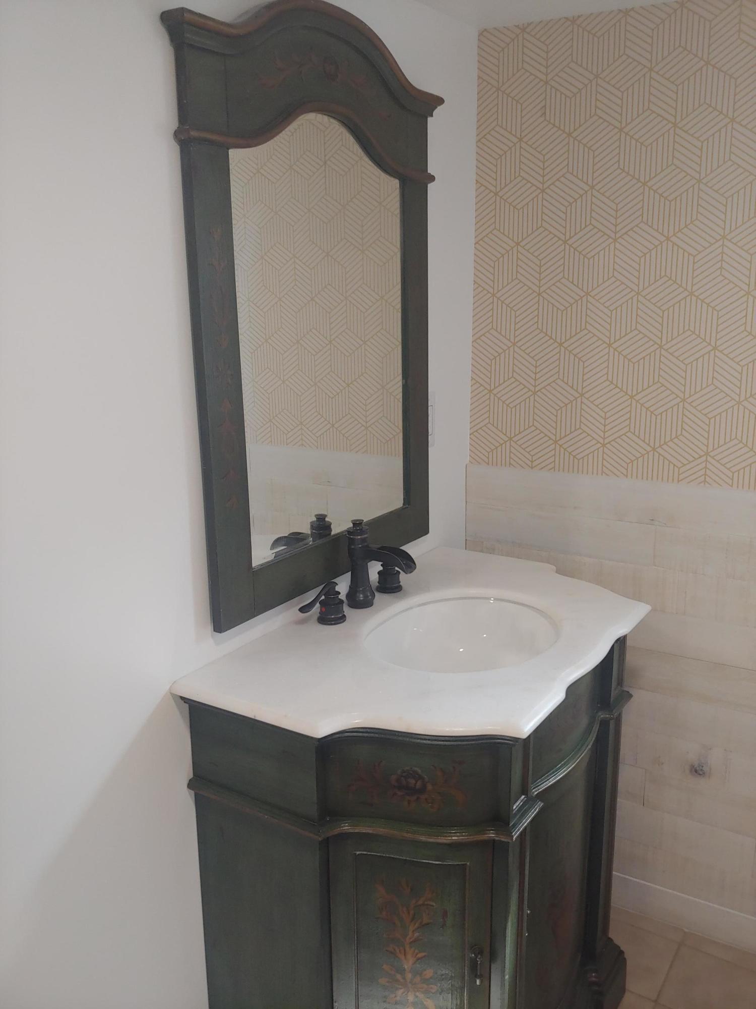 516 Red Rock Road Cresco, PA 18326 - Photo 36 of 47 a bathroom with a sink and a mirror