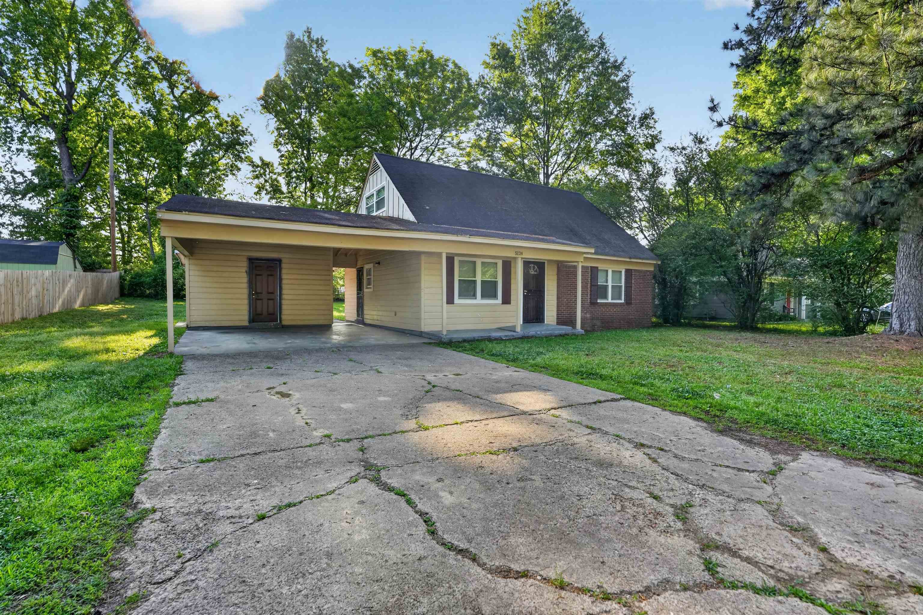 5124 Gill Road Memphis, TN 38109 - Photo 1 of 33 Single-story dwelling with brick and horizontal siding elements