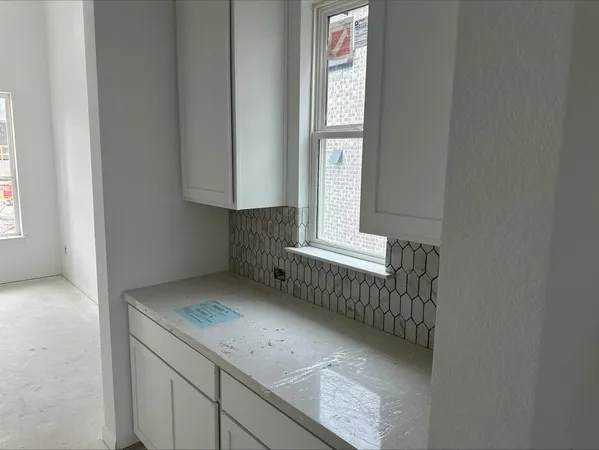 a view of hallway with window