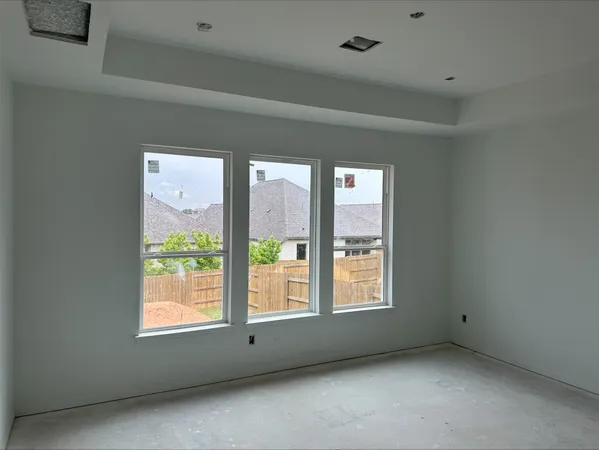 an empty room with windows