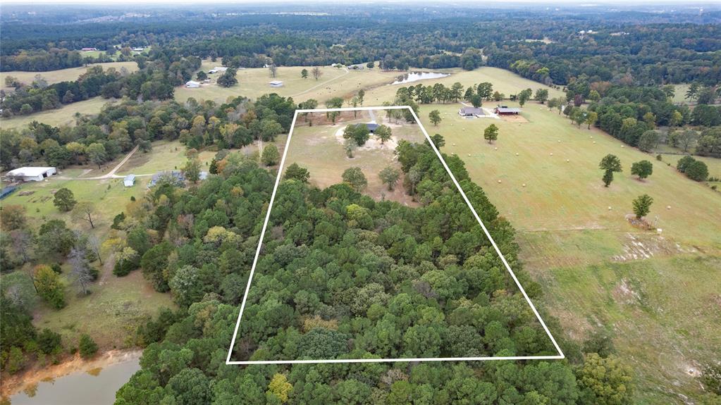 2804 Buchanan Road Hallsville, TX 75650 - Photo 40 of 40 an aerial view of residential houses with outdoor space