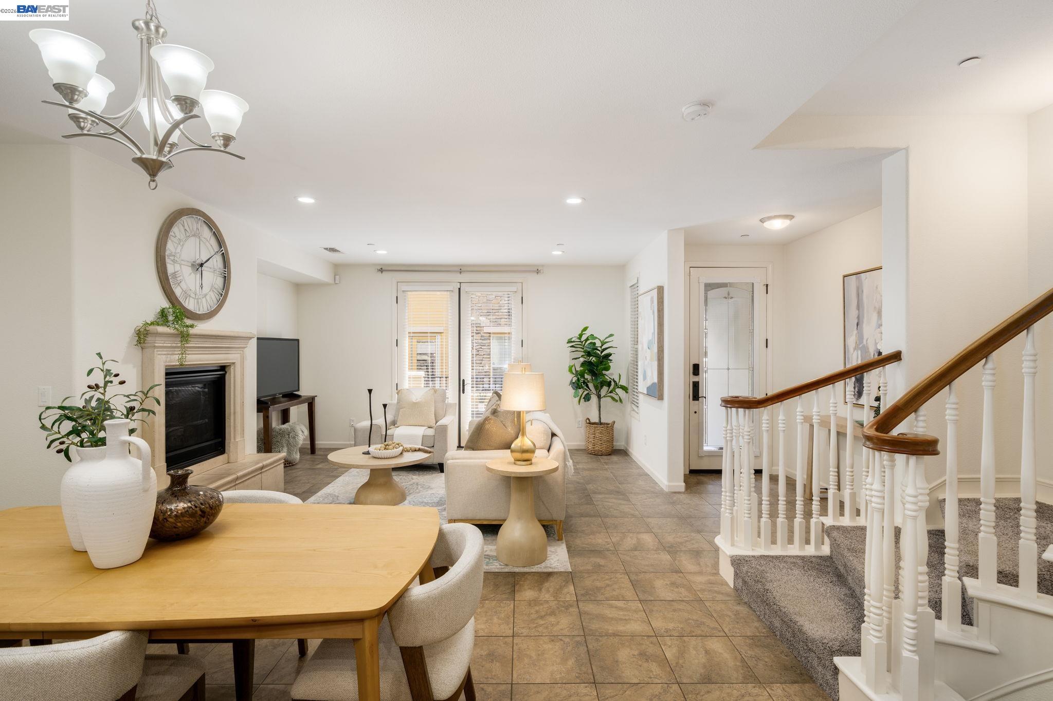 4653 Rimini Court Dublin, CA 94568 - Photo 11 of 44 a living room with fireplace furniture and a fireplace