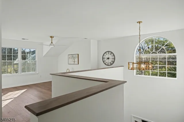 a view of a hallway with workspace