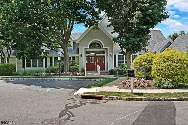 front view of a house with a small yard