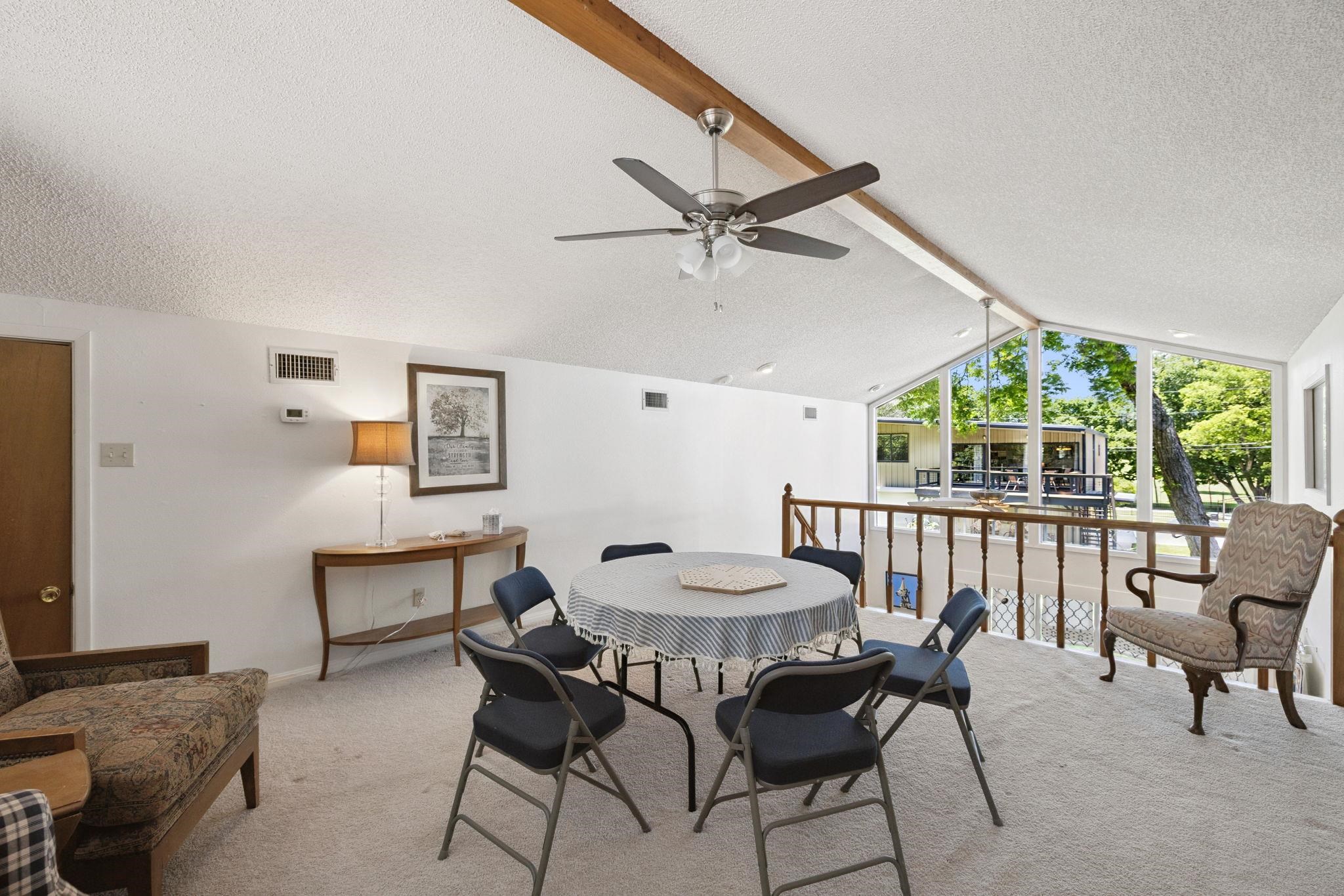 1435 East Zipp Road New Braunfels, TX 78130 - Photo 30 of 43 a view of a dining room with furniture window and outside view