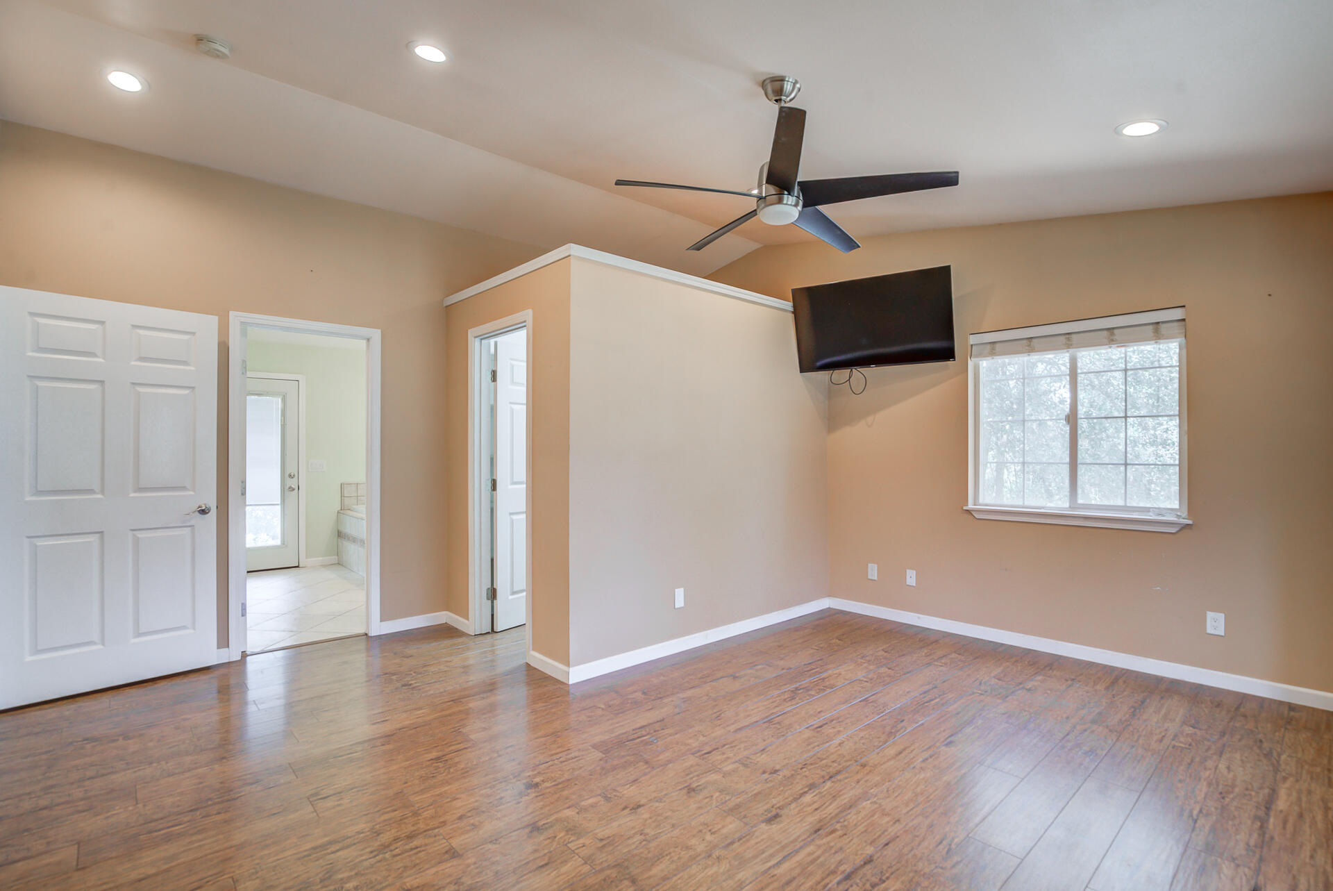 18080 Benson Road Cottonwood, CA 96022 - Photo 19 of 54 wooden floor in an empty room with a window