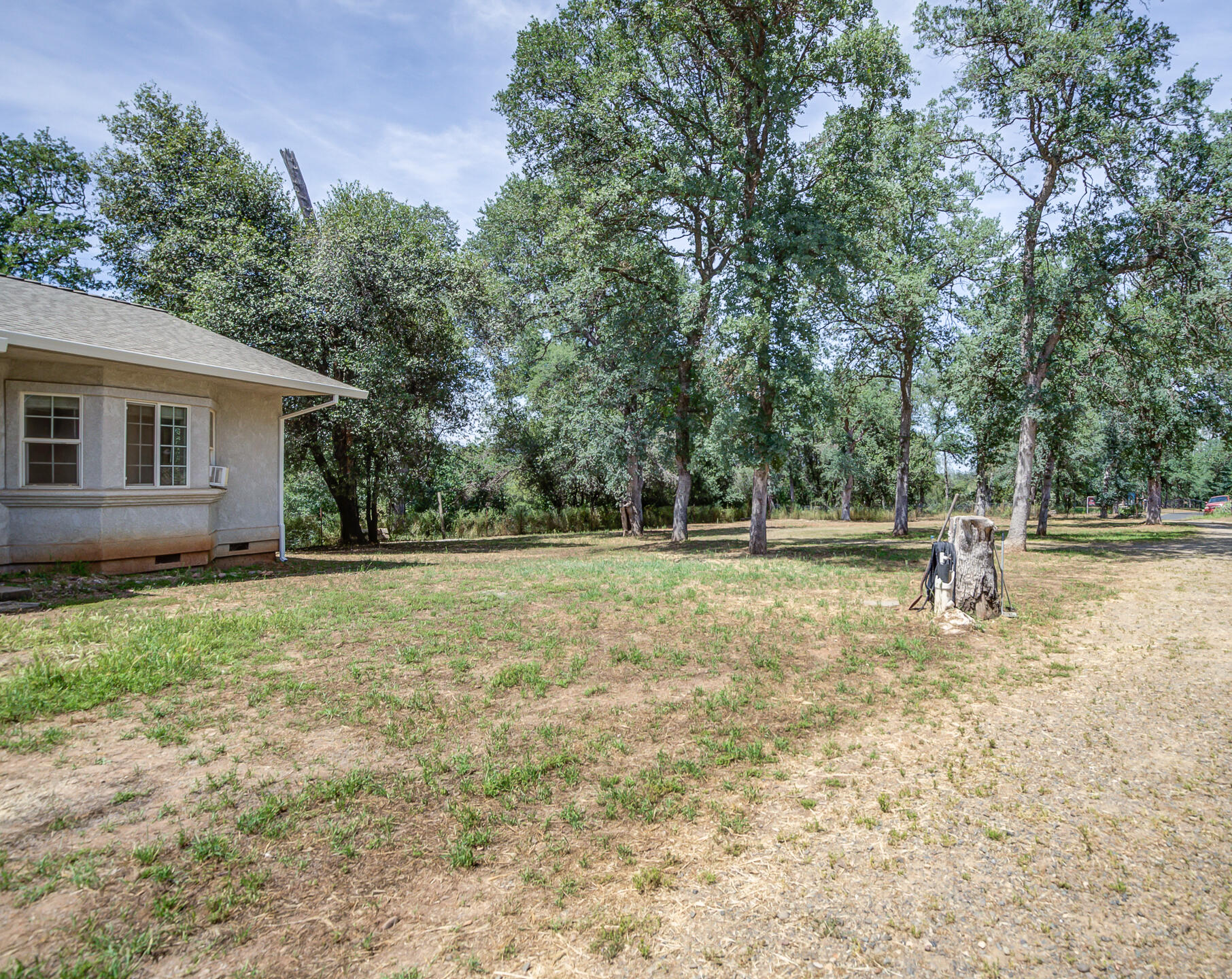18080 Benson Road Cottonwood, CA 96022 - Photo 45 of 54 a view of outdoor space with deck and yard