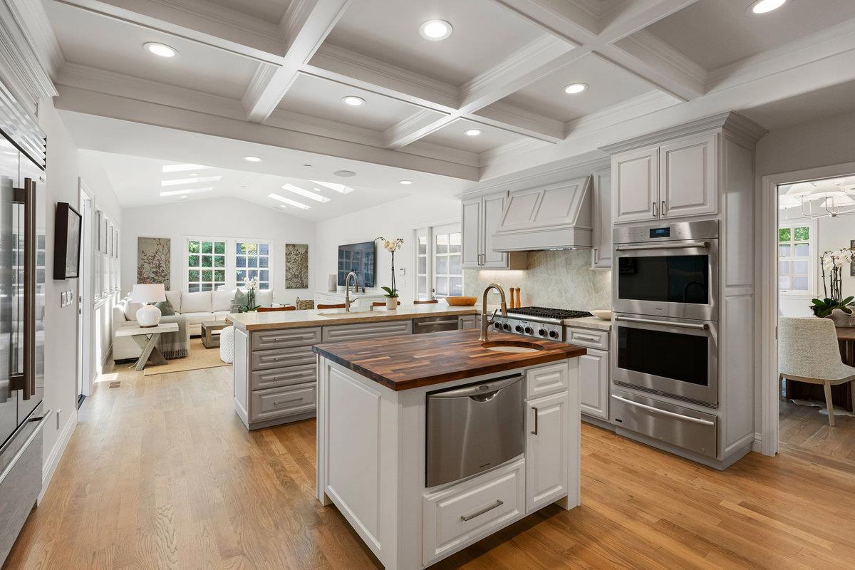 130 Stonehedge Road Hillsborough, CA 94010 - Photo 11 of 32 a kitchen with stainless steel appliances granite countertop a stove and a sink