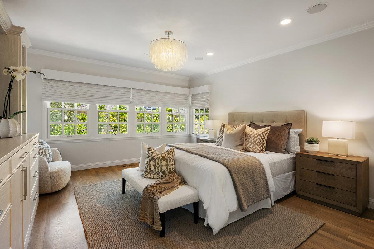 130 Stonehedge Road Hillsborough, CA 94010 - Photo 14 of 32 a bedroom with bed and a large window