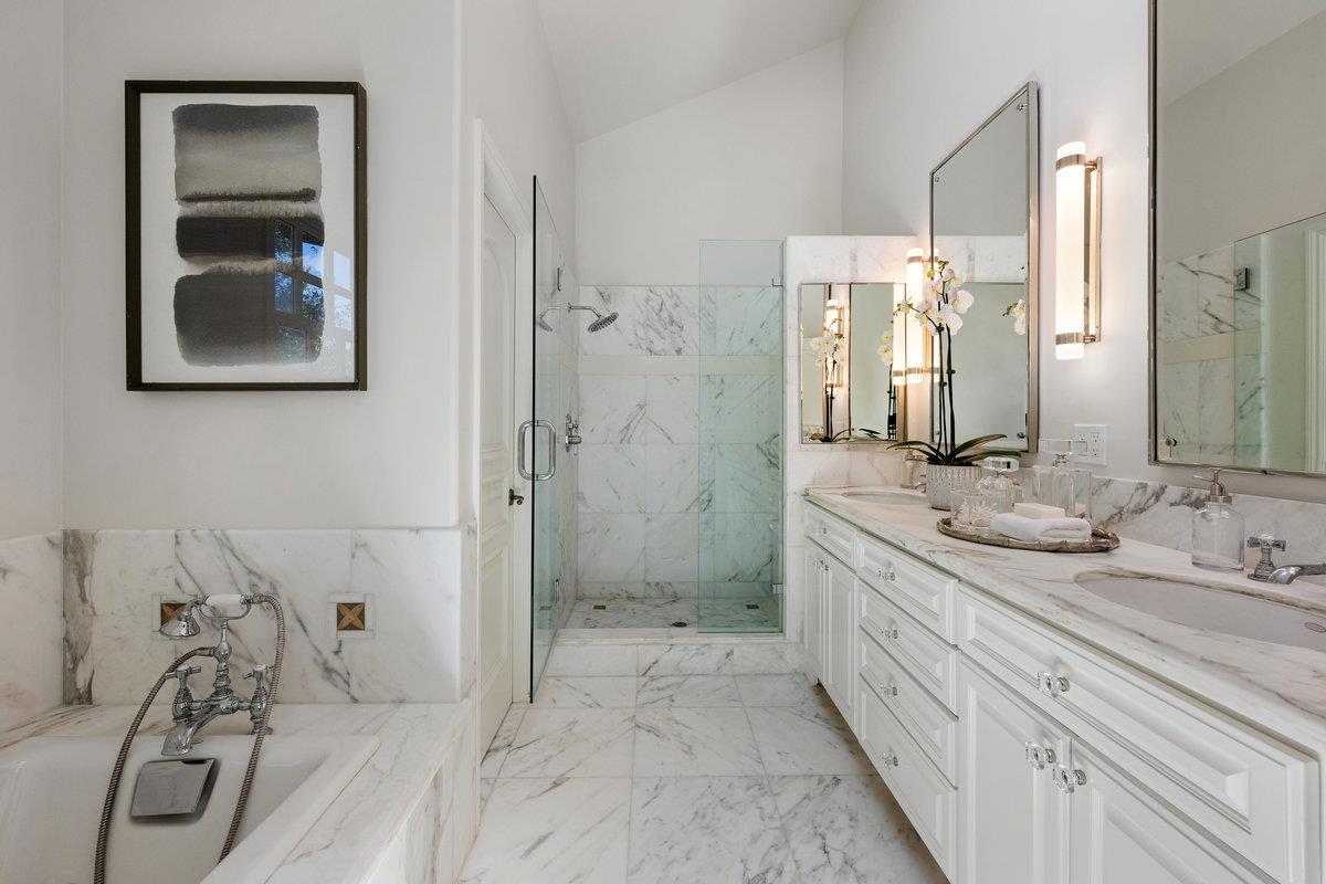 130 Stonehedge Road Hillsborough, CA 94010 - Photo 16 of 32 a bathroom with a double vanity sink mirror and shower