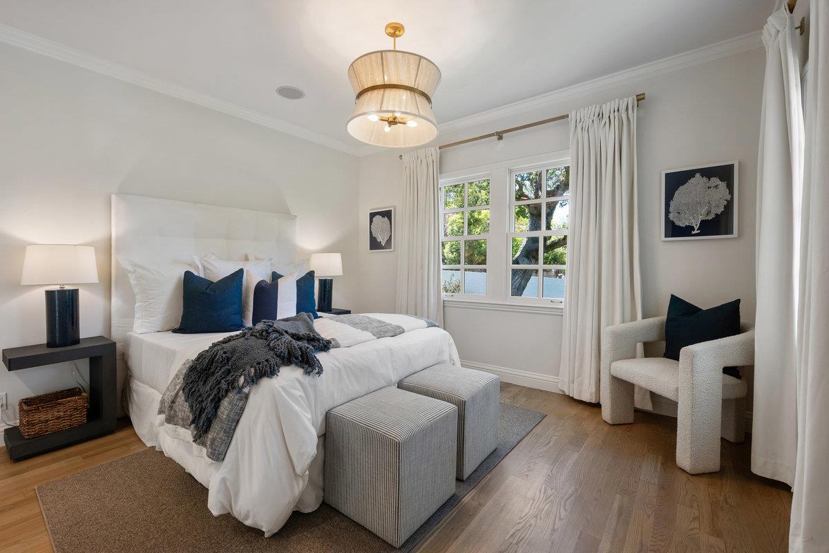 130 Stonehedge Road Hillsborough, CA 94010 - Photo 18 of 32 a spacious bedroom with a bed and a couch