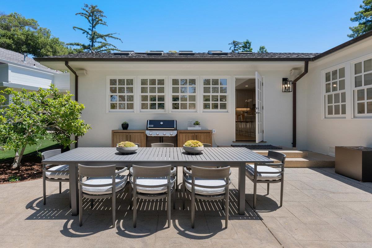 130 Stonehedge Road Hillsborough, CA 94010 - Photo 22 of 32 a view of a patio with couches table and chairs and potted plants