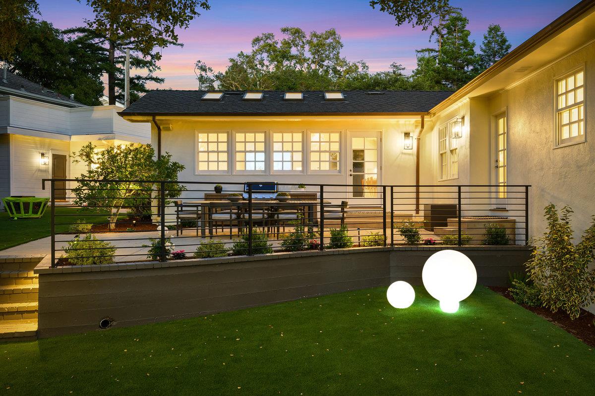 130 Stonehedge Road Hillsborough, CA 94010 - Photo 29 of 32 a view of a swimming pool with a table and chairs