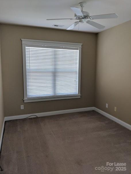 16535 Knox Run Road Huntersville, NC 28078 - Photo 12 of 15 an empty room with a window