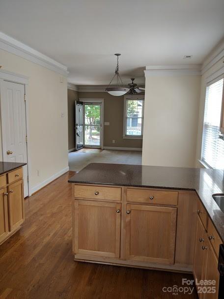 16535 Knox Run Road Huntersville, NC 28078 - Photo 4 of 15 a view of a kitchen with window and wooden floor