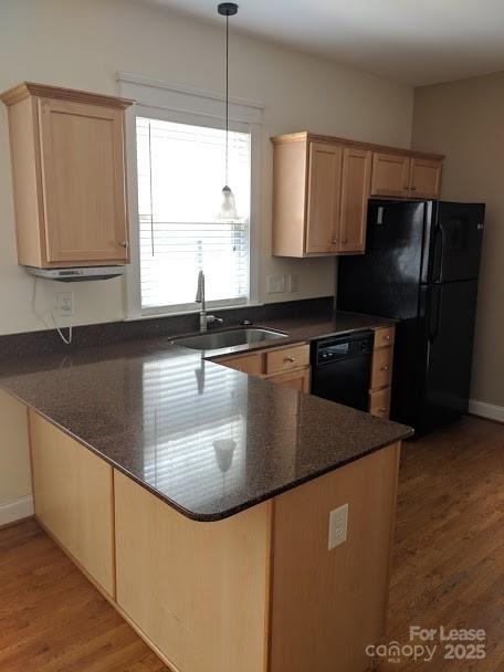 16535 Knox Run Road Huntersville, NC 28078 - Photo 5 of 15 a kitchen with granite countertop a sink a counter top space appliances and cabinets
