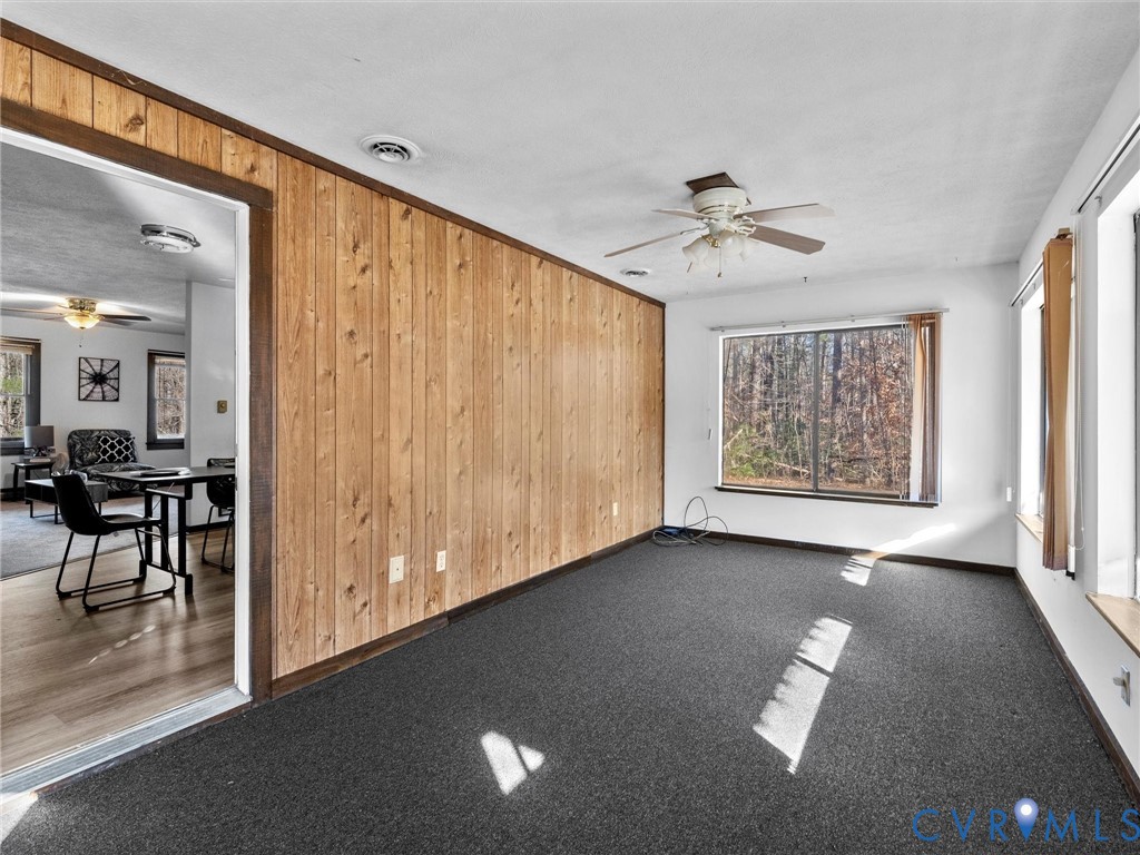 4905 Old Buckingham Road Powhatan, VA 23139 - Photo 15 of 50 a view of an empty room with a window