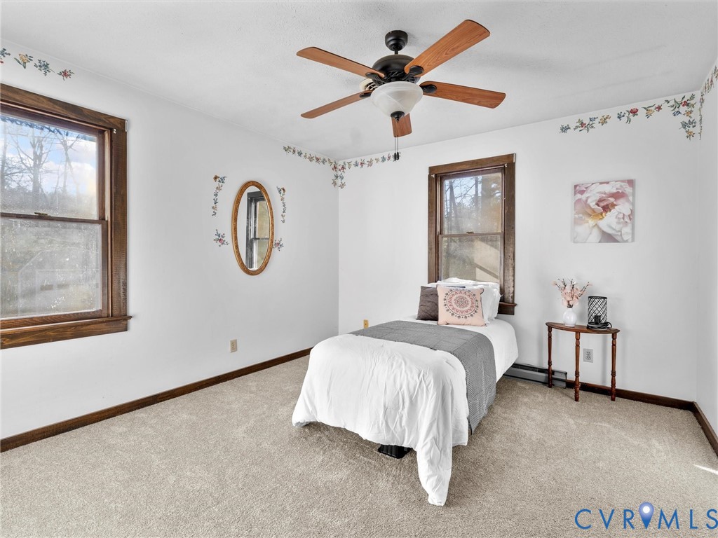 4905 Old Buckingham Road Powhatan, VA 23139 - Photo 21 of 50 a bed room with a bed and a window