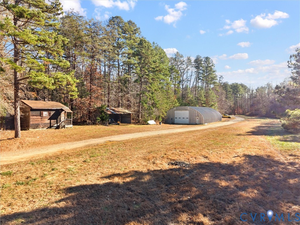 4905 Old Buckingham Road Powhatan, VA 23139 - Photo 34 of 50 a view of outdoor space yard and swimming pool