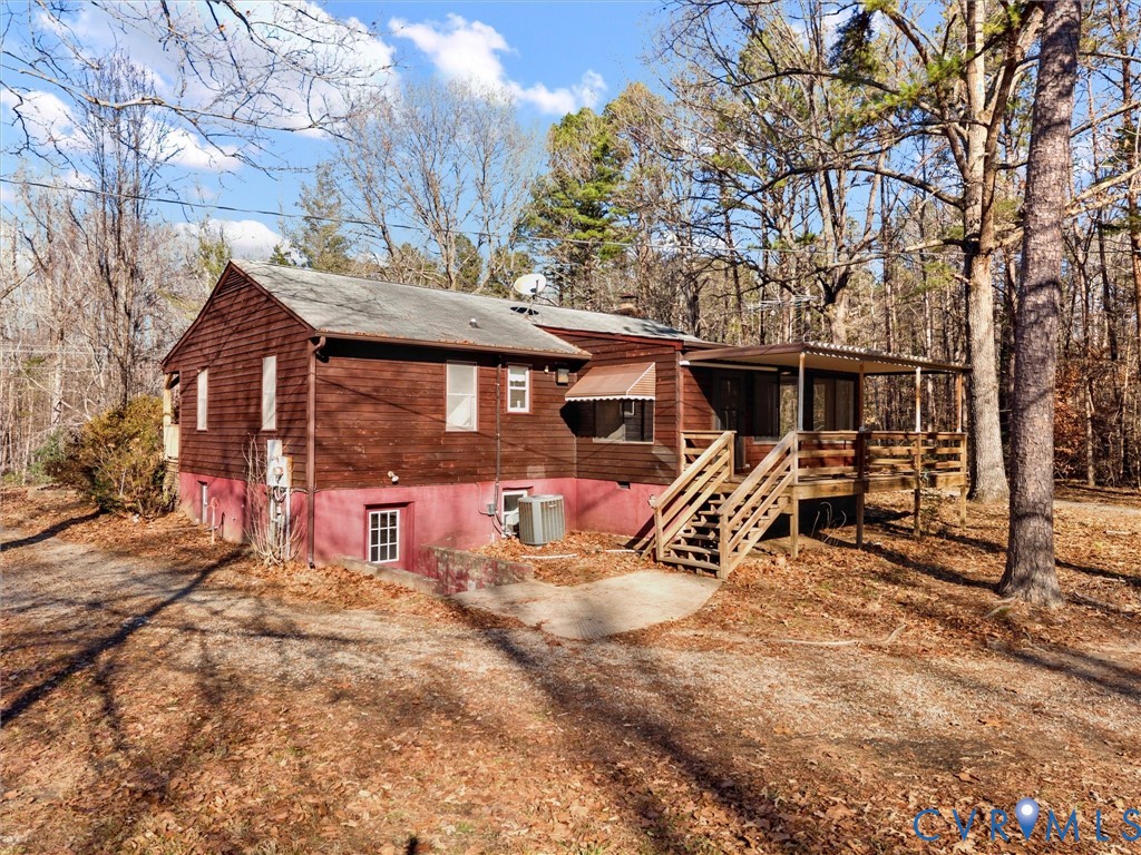 4905 Old Buckingham Road Powhatan, VA 23139 - Photo 4 of 50 a view of a house with a patio