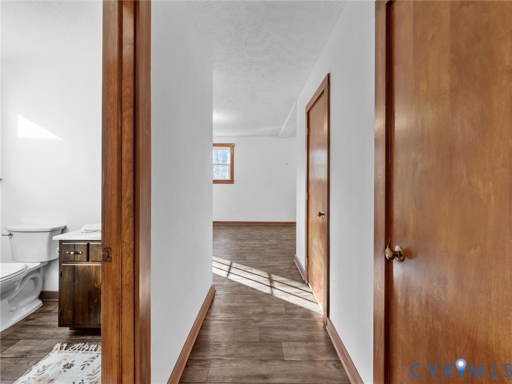 4905 Old Buckingham Road Powhatan, VA 23139 - Photo 47 of 50 a view of a hallway with a dining room