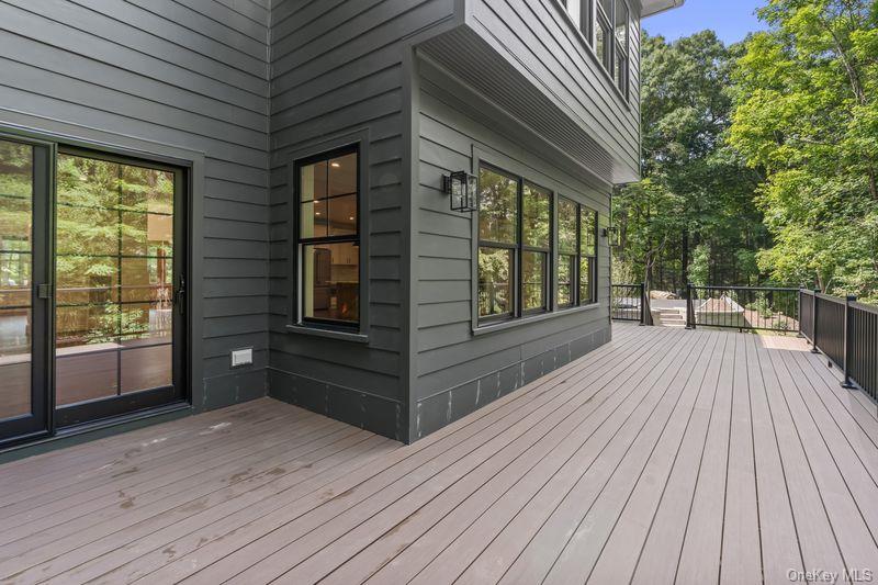 86 Old Logging Road Pound Ridge, NY 10576 - Photo 24 of 50 Oversized deck with 2 entrances into the house