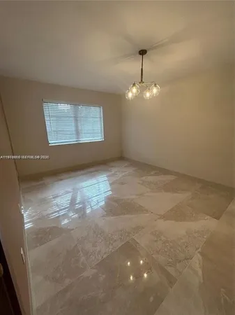 a view of a room with an empty space