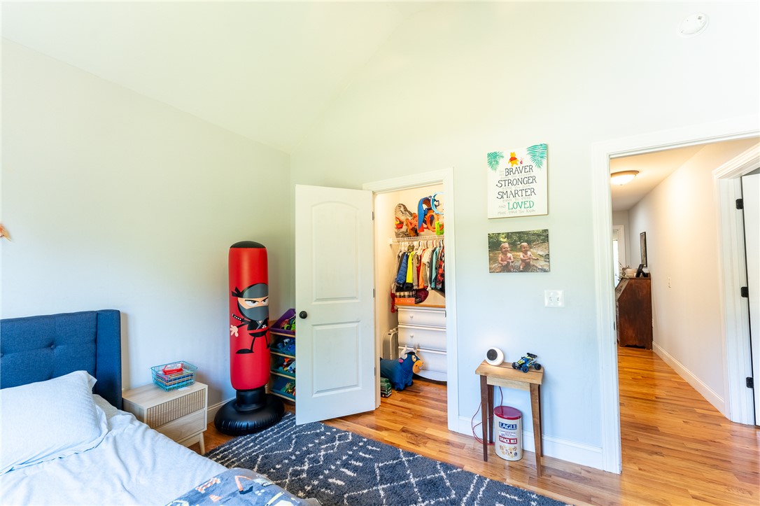 696 Mt Olivet Road Six Mile, SC 29682 - Photo 15 of 35 This bright and airy bedroom features rich hardwood flooring and a functional closet.